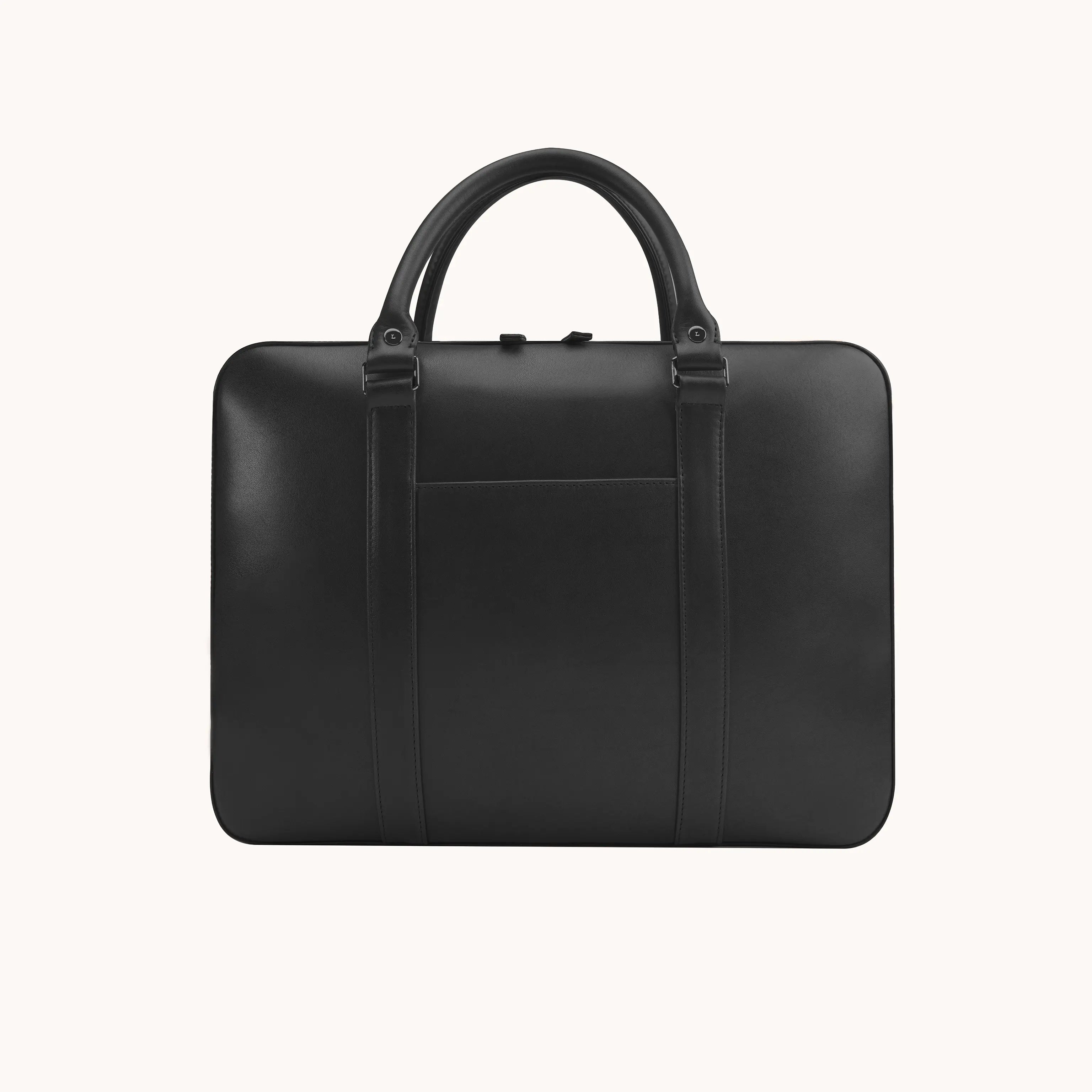 Lunburg Opus Briefcase in Burnt Timber vegetable-tanned Perpetual Leather (from Tempesti), front view showing exterior slip pocket, folded leather handles, and 316L stainless steel hardware.