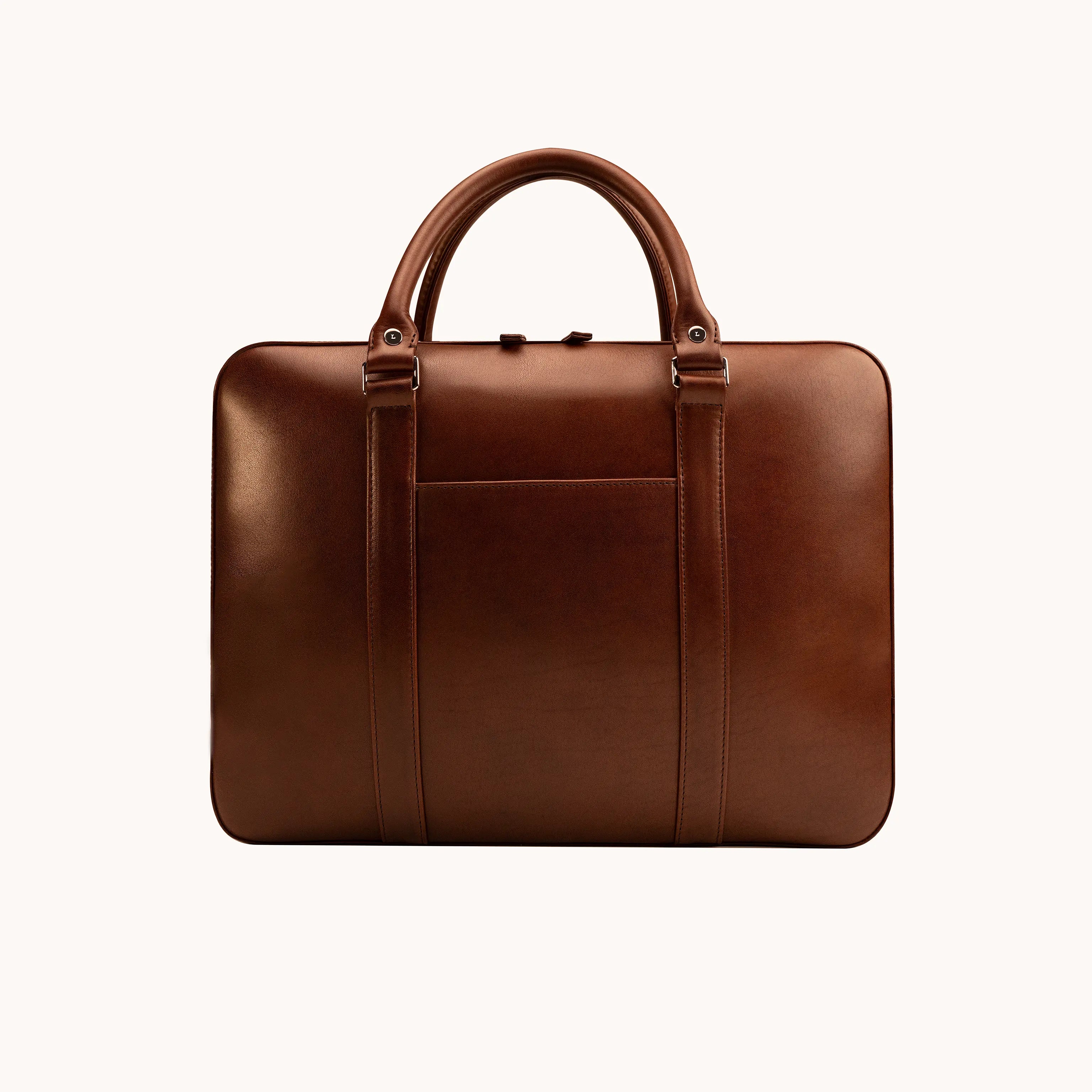 Lunburg Opus Briefcase in Deep Mahogany vegetable-tanned Perpetual Leather (from Tempesti), front view showing exterior slip pocket, folded leather handles, and 316L stainless steel hardware.