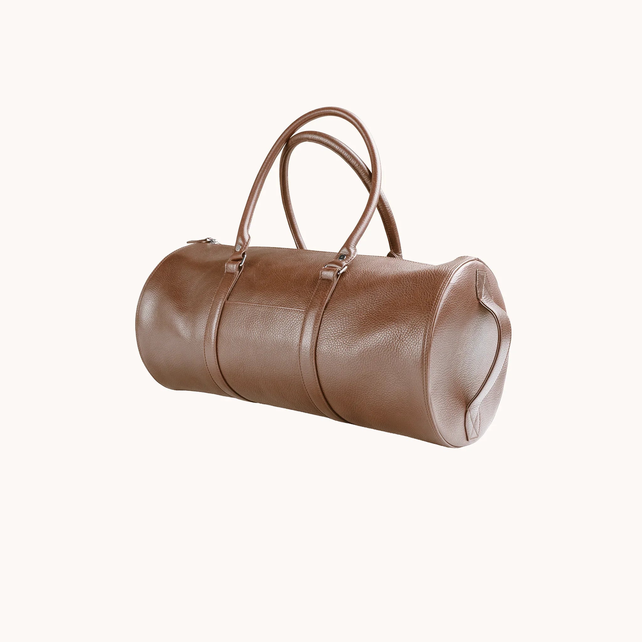 Lunburg Estate Club Bag in tumbled Heritage Amber leather, three-quarter view showing depth and handle drop.