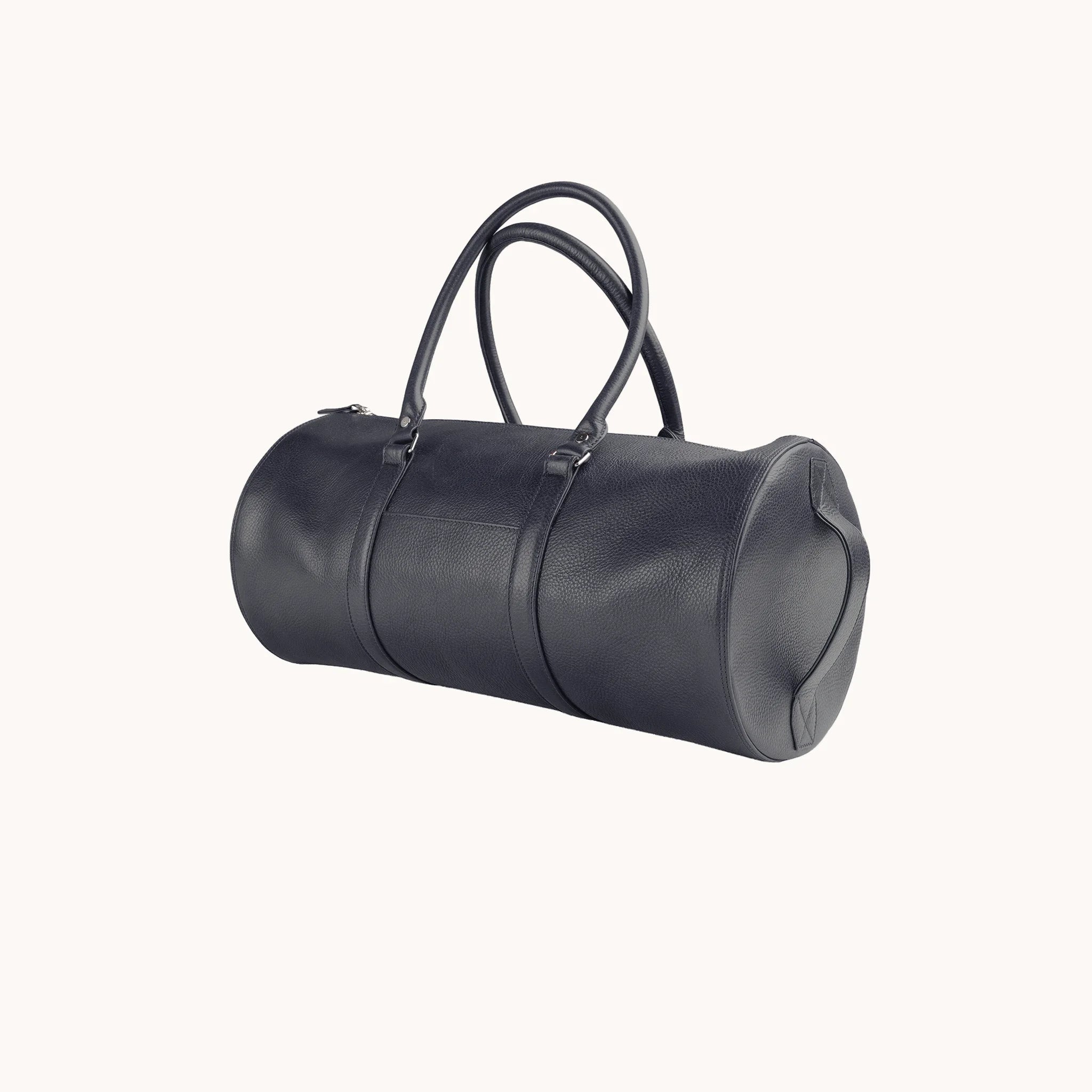 Lunburg Estate Club Bag in tumbled Nocturnal Sapphire leather, three-quarter view showing depth and handle drop.