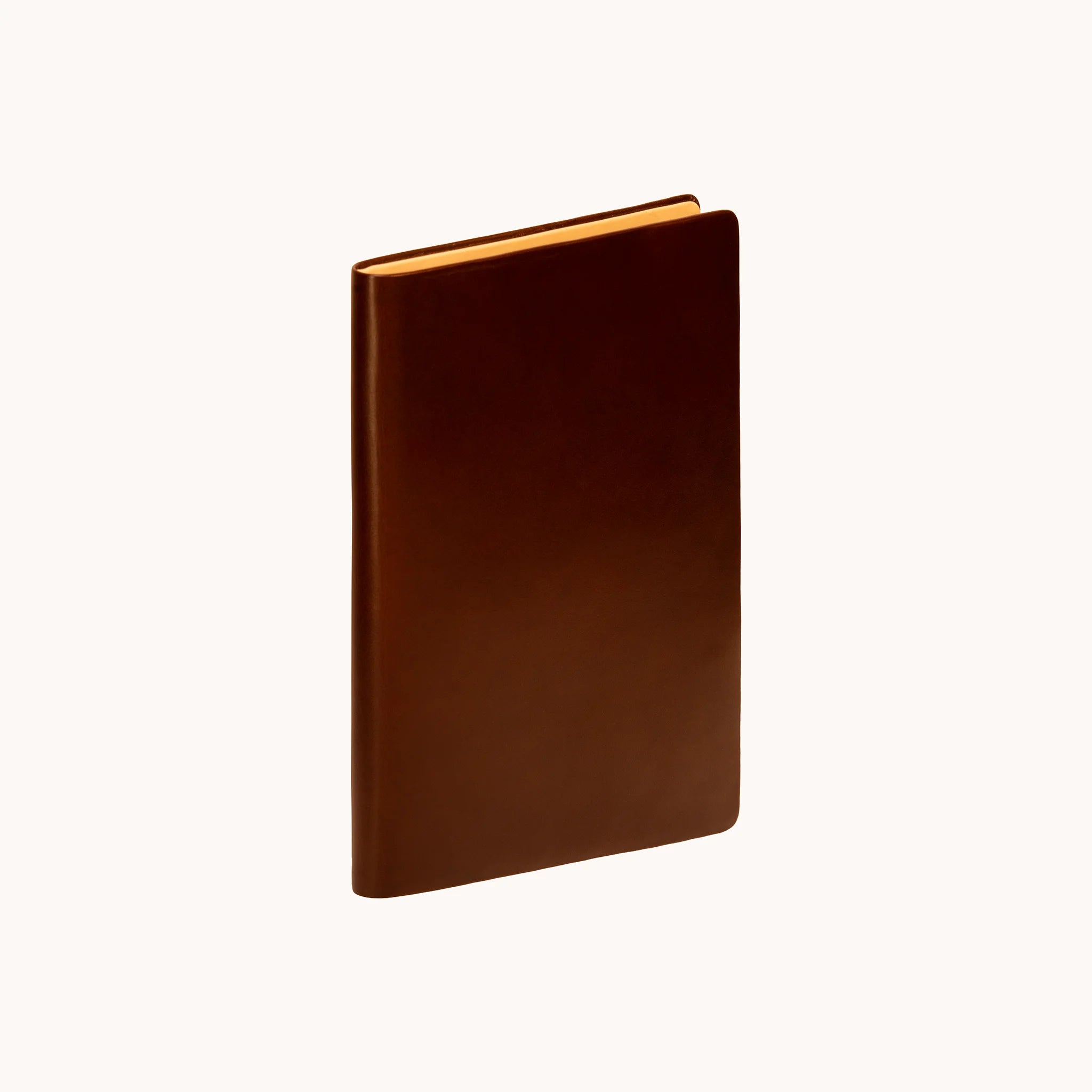 Lunburg Memoir Document Folder in Deep Mahogany, fully open interior view showing the goat leather lining with document pockets on both panels and the heat-embossed Lunburg mark on the lower right, in vegetable-tanned Perpetual Leather (from Tempesti) with folded edge construction throughout."