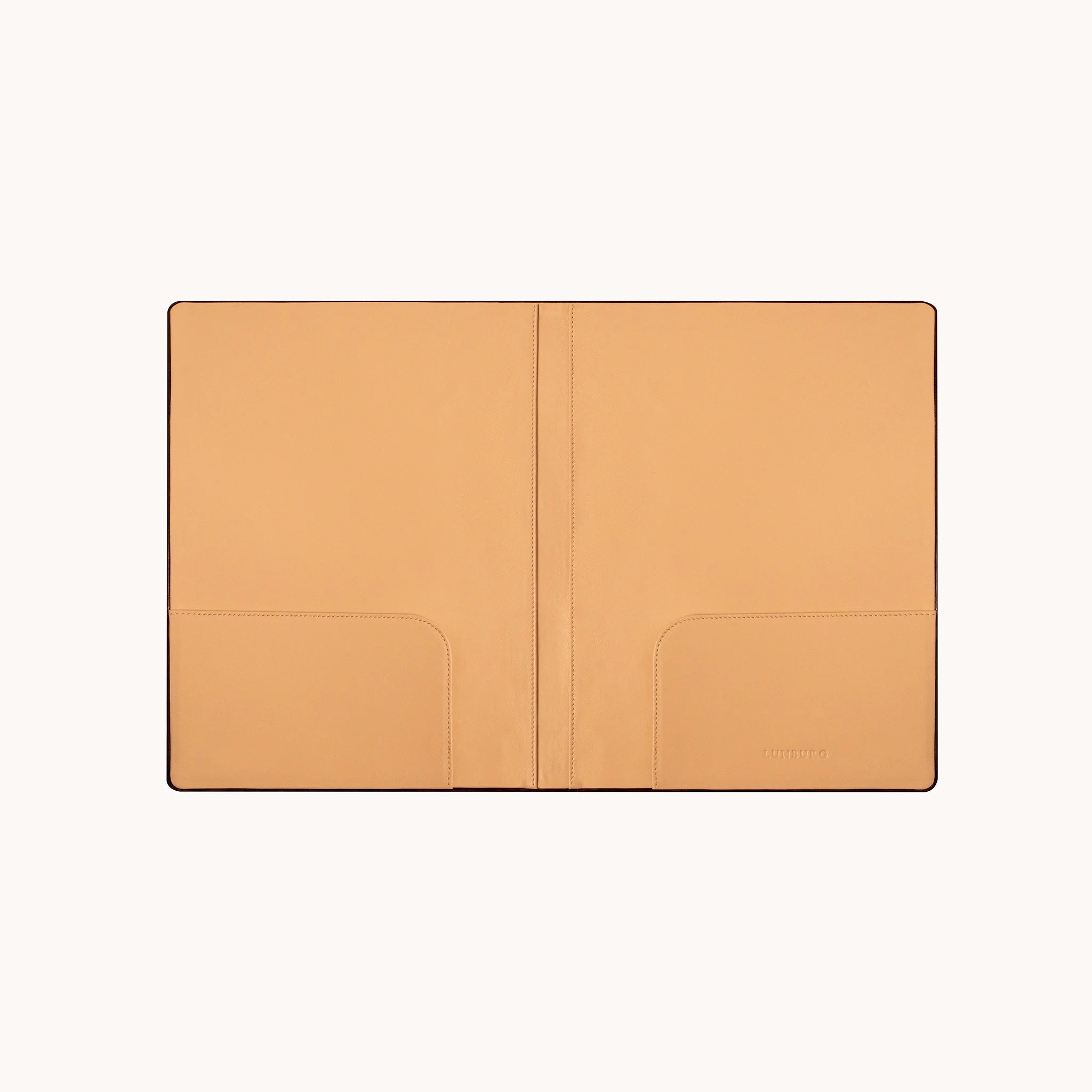 Lunburg Memoir Document Folder, fully open interior view showing the goat leather lining with document pockets on both panels and the heat-embossed Lunburg mark on the lower right, in vegetable-tanned Perpetual Leather (from Tempesti) with folded edge construction throughout.