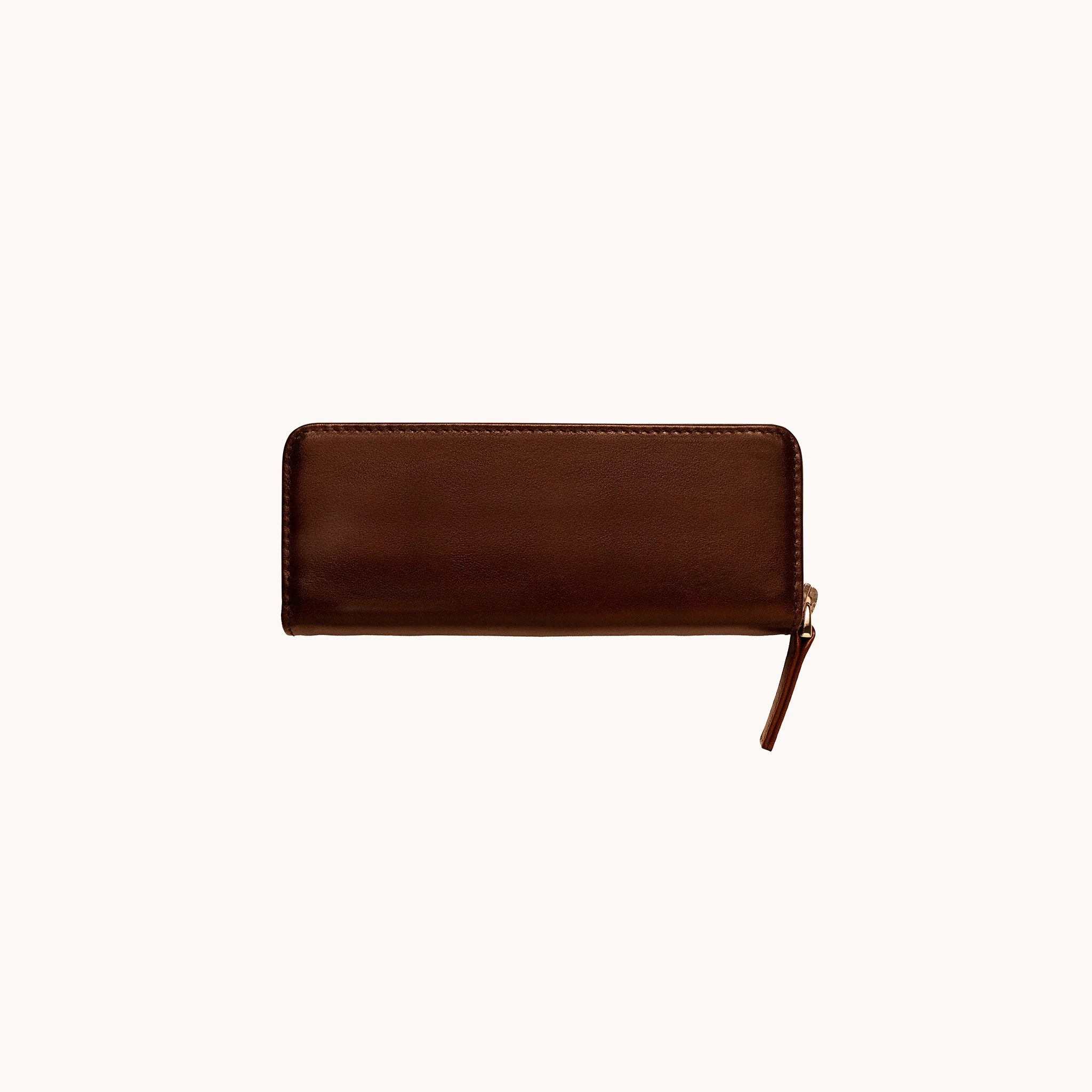 Lunburg Double Pen Case Curator in Deep Mahogany, front view of closed case in vegetable-tanned Perpetual Leather (from Tempesti), YKK Excella zipper pull resting at lower left, folded edge construction visible along all perimeter edges.