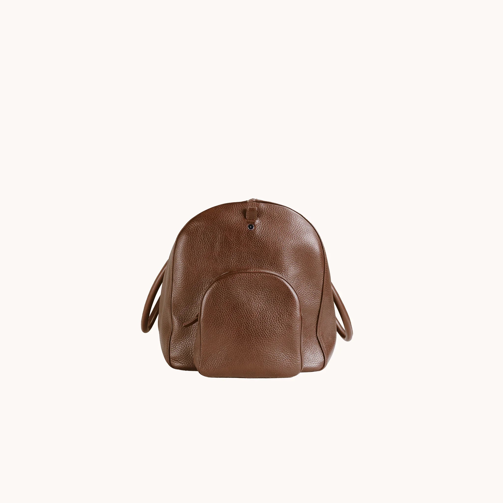 Lunburg Estate Duffle Bag in tumbled Heritage Amber leather, side profile showing volume and handle attachment.