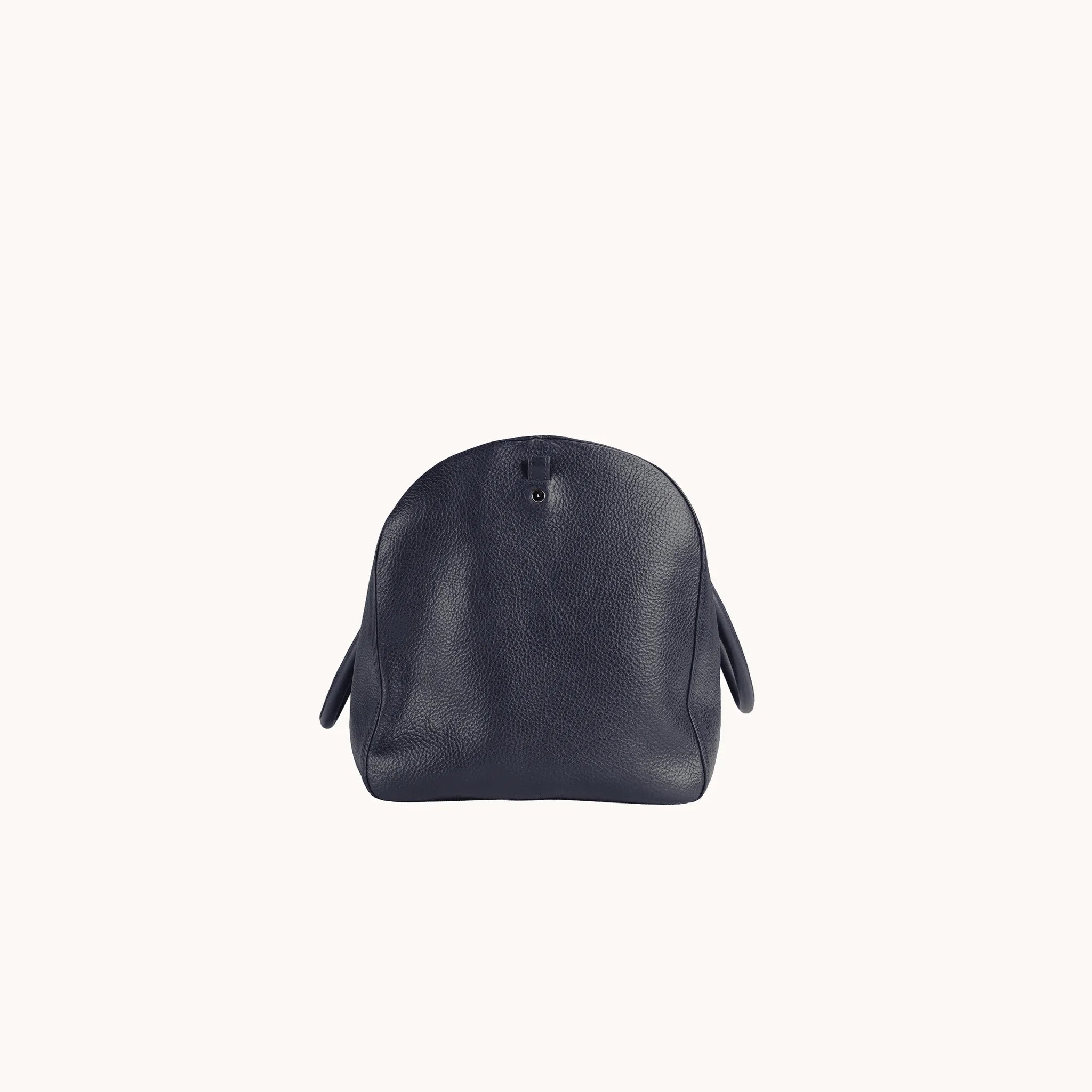 Lunburg Estate Duffle Bag in tumbled Nocturnal Sapphire leather, opposite side profile with side seam and base.