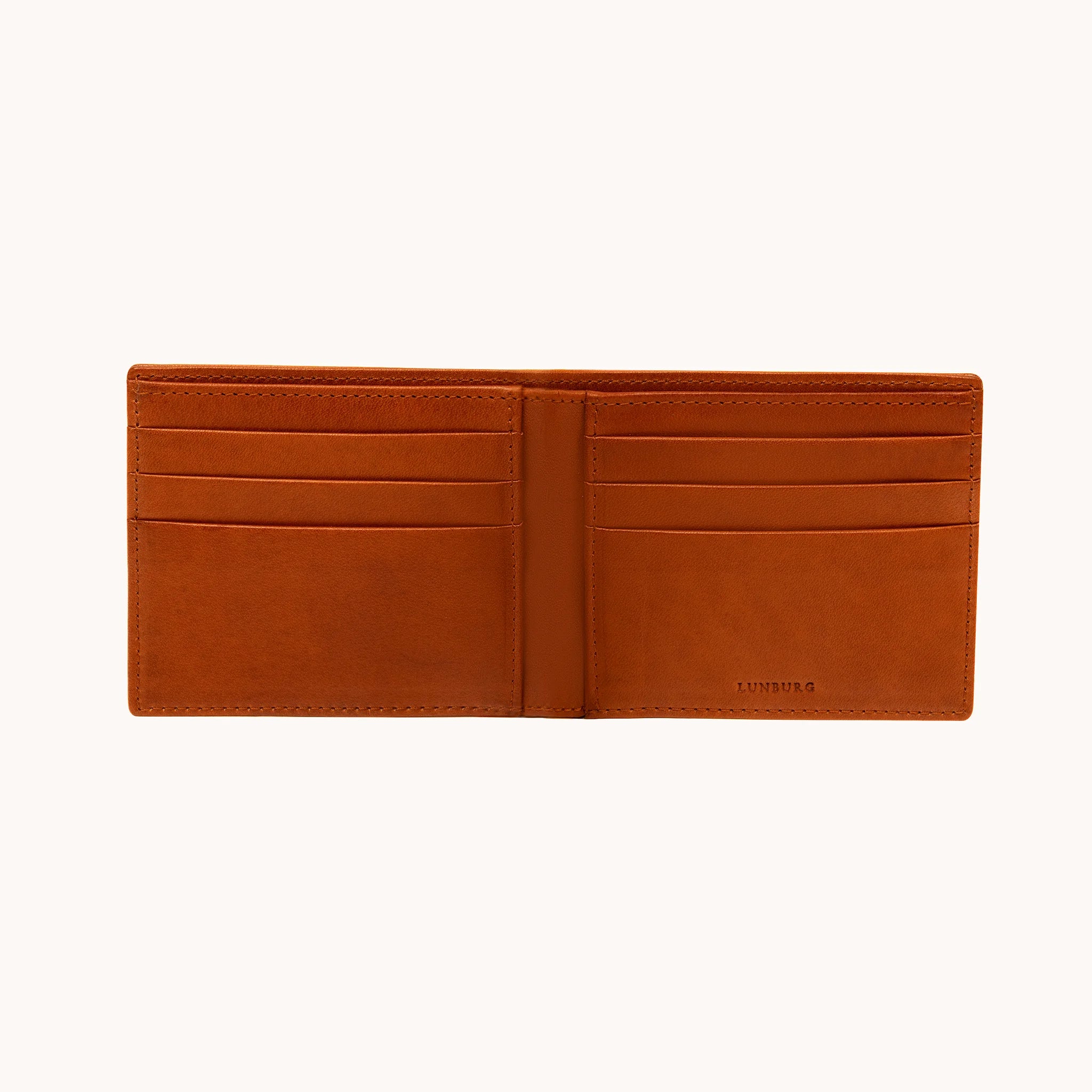 Lunburg Horizontal Signet Bifold Wallet in Heritage Amber fully opened, displaying six card slots across both panels, folded edge construction, and heat-embossed Lunburg mark on lower right, in vegetable-tanned Perpetual Leather.