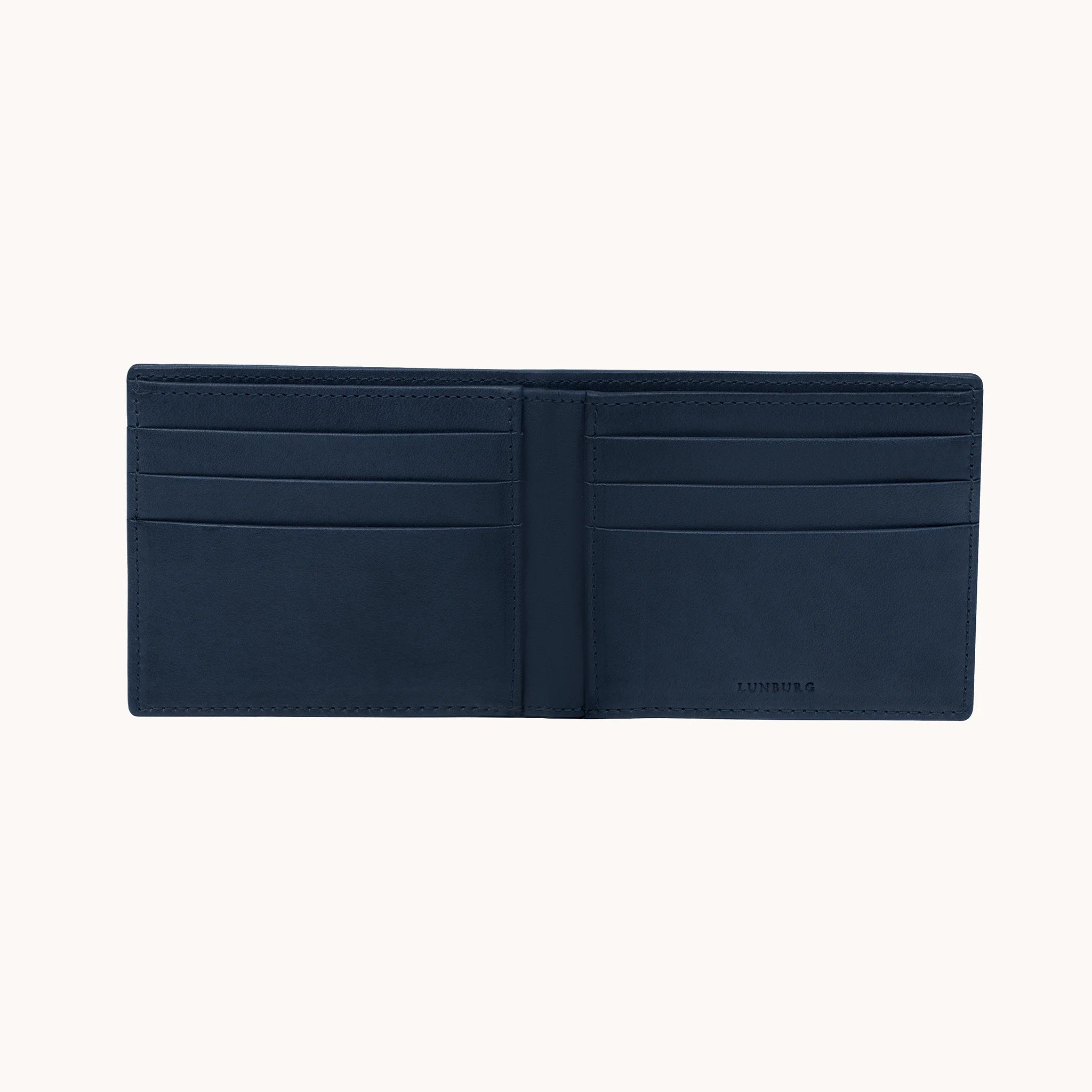 Lunburg Signet Horizontal Bifold in Nocturnal Sapphire, fully open interior view showing card slots on both panels and the heat-embossed Lunburg mark on the lower right, in vegetable-tanned Perpetual Leather (from Tempesti) with folded edge construction throughout.