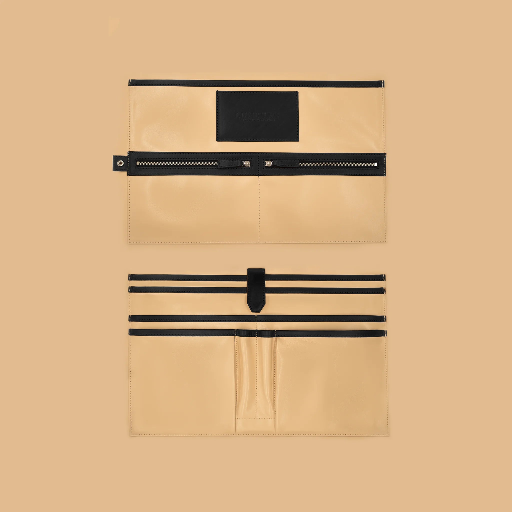 Lunburg Opus Briefcase Integral interior vertical layout in Burnt Timber, high-contrast goat leather lining with heat-embossed Lunburg card holder, two pen holders, dedicated compartments for laptop, tablet, and documents, two zipped pockets for secure storage, and four large open pockets for accessories, with Burnt Timber Perpetual Leather (from Tempesti) trim and 316L stainless steel hardware.