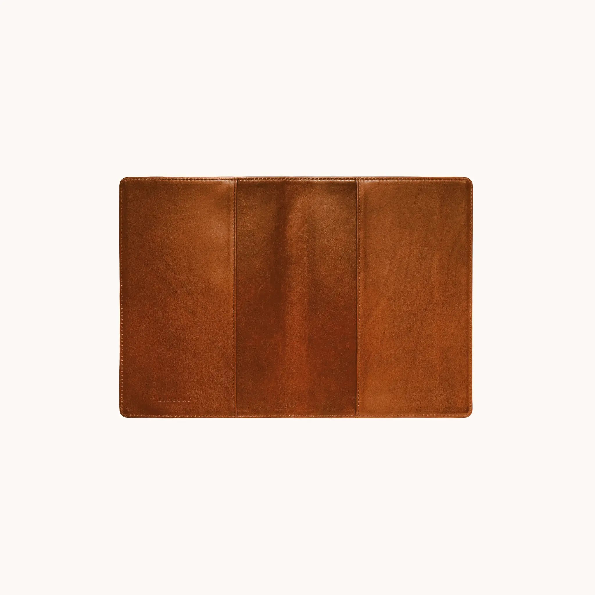 Lunburg Memoir Pocket Notebook Cover in Heritage Amber, fully open interior view showing the left and right tuck sleeves and the heat-embossed Lunburg mark on the lower left, in vegetable-tanned Perpetual Leather (from Tempesti) with folded edge construction throughout.