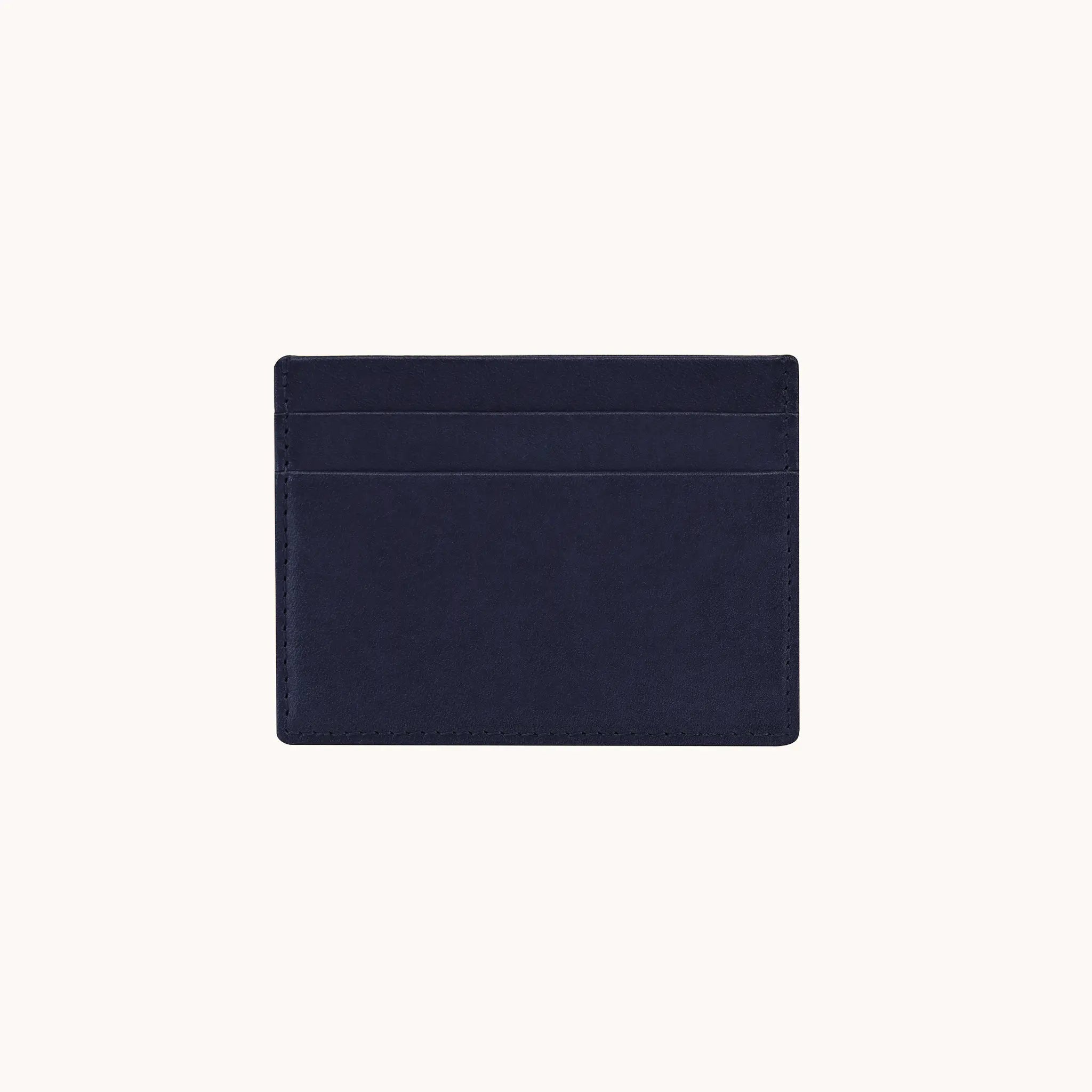Lunburg Signet Card Holder in Nocturnal Sapphire, back view showing card slots in vegetable-tanned Perpetual Leather (from Tempesti) with folded edge construction
