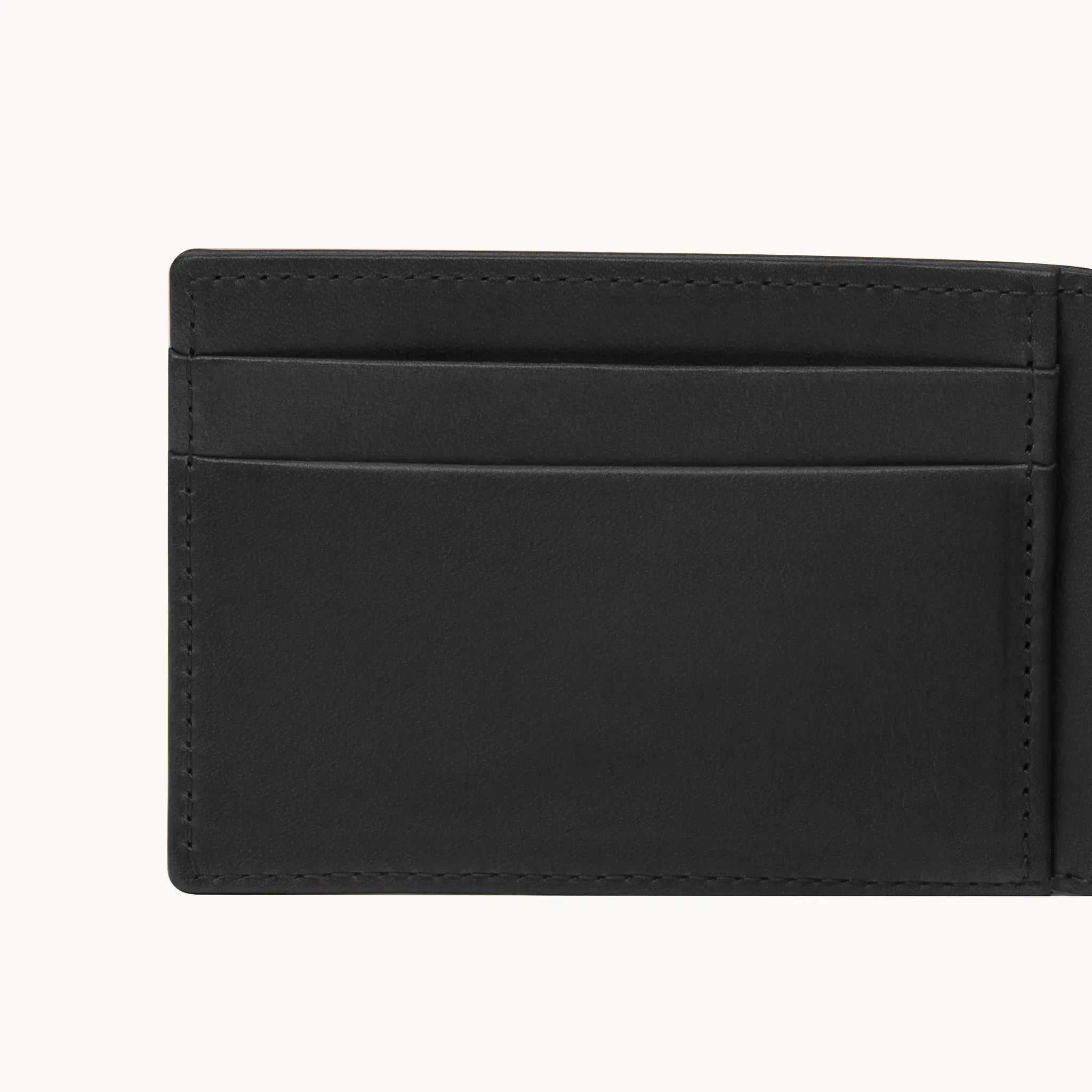 Lunburg Signet Small Horizontal in Burnt Timber, close-up detail of the interior card slot layering and large open pocket showing the folded edge construction of Rempliage on each pocket edge, in vegetable-tanned Perpetual Leather (from Tempesti).