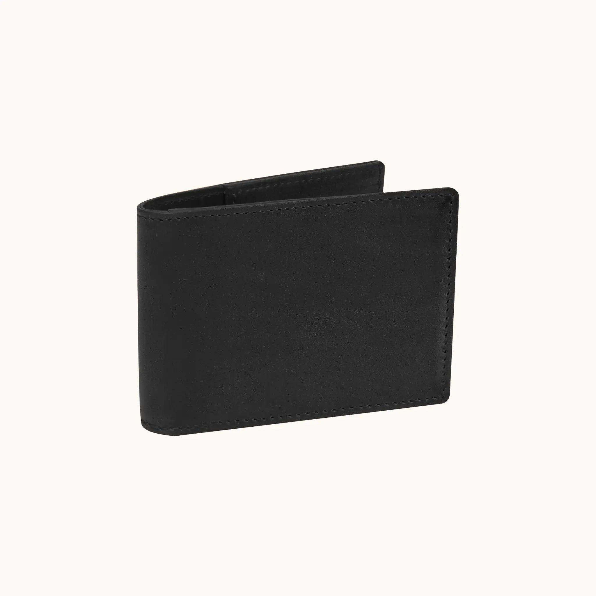 Lunburg Signet Small Horizontal in Burnt Timber, three-quarter view slightly open showing the exterior grain, spine, and a glimpse of the interior, in vegetable-tanned Perpetual Leather (from Tempesti) with folded edge construction.