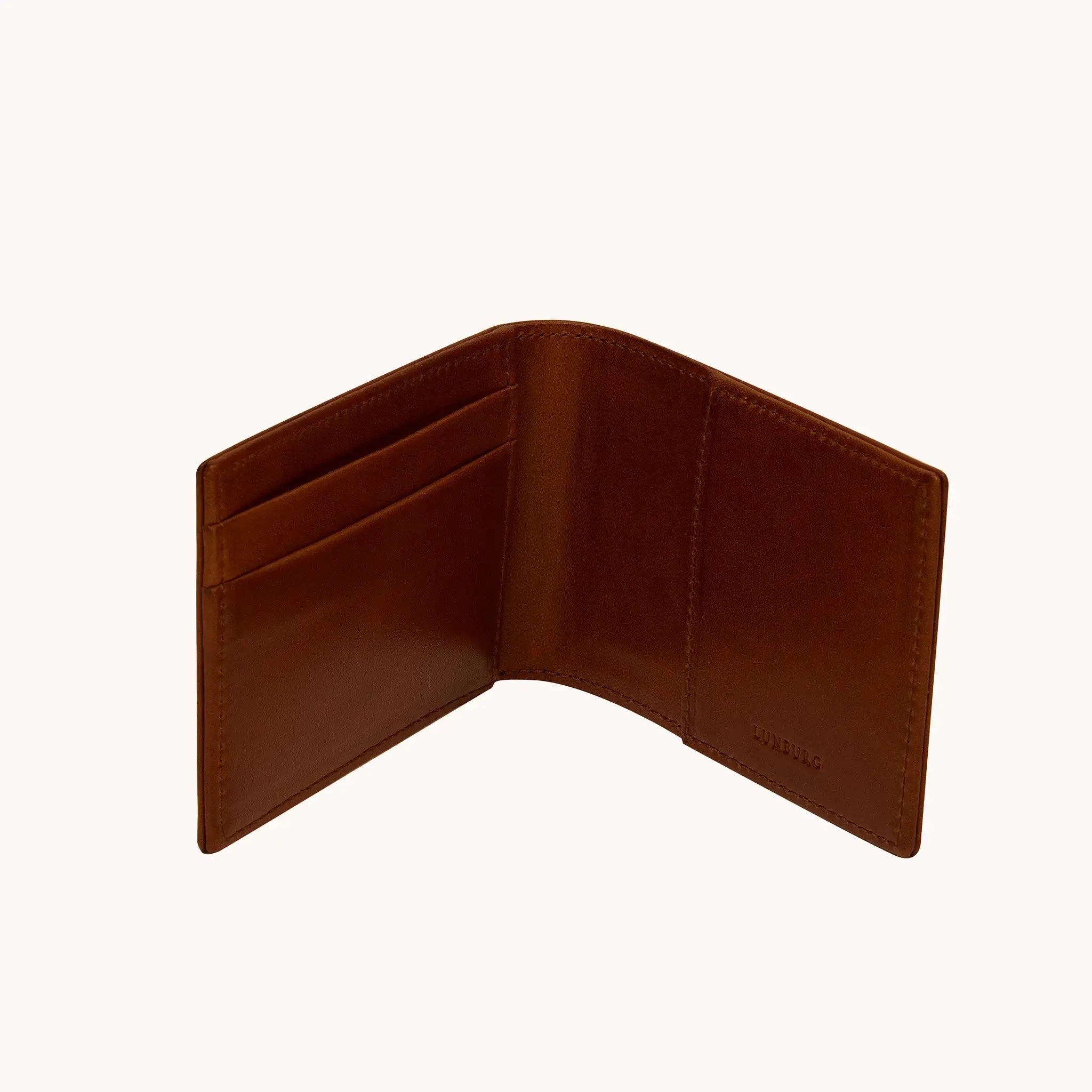 Lunburg Signet Small Horizontal in Deep Mahogany, open interior view showing card slots on the left panel, a large open pocket on the right panel, and the heat-embossed Lunburg mark on the lower right, in vegetable-tanned Perpetual Leather (from Tempesti) with folded edge construction throughout.