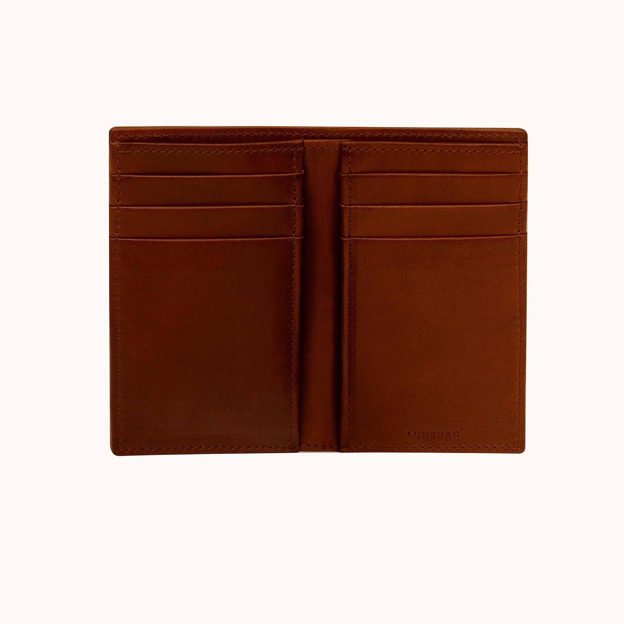 Lunburg Signet Vertical Bifold in Deep Mahogany, fully open interior view showing card slots on both panels and the heat-embossed Lunburg mark on the lower right, in vegetable-tanned Perpetual Leather (from Tempesti) with folded edge construction throughout.