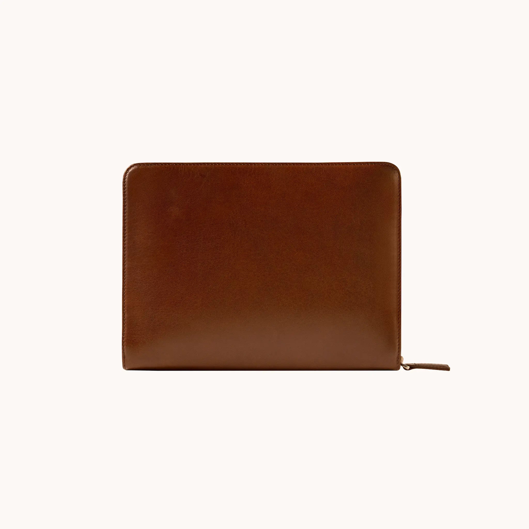 Lunburg Memoir Workstation in Deep Mahogany, front view showing the clean face and YKK Excella zipper with leather pull, in vegetable-tanned Perpetual Leather (from Tempesti) with folded edge construction.