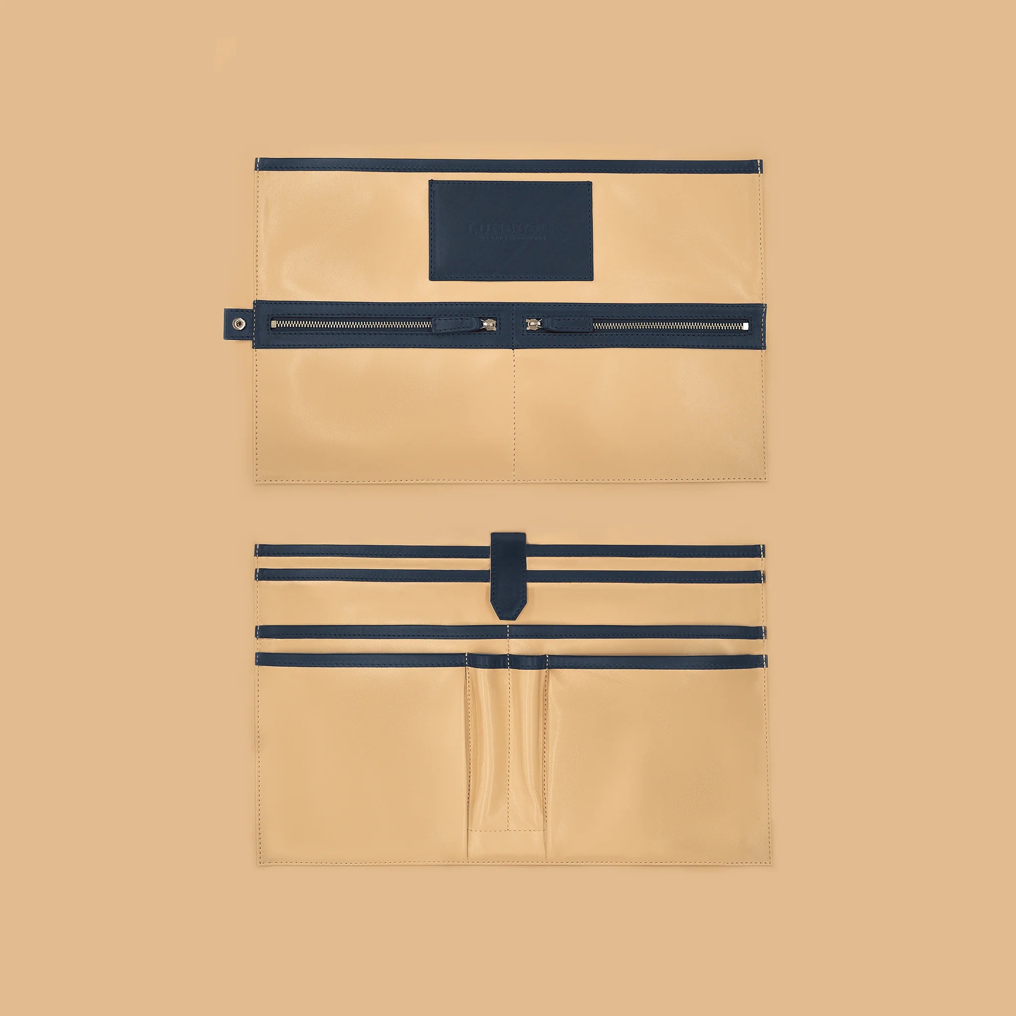 Lunburg Opus Briefcase Integral interior vertical layout in Nocturnal Sapphire, high-contrast goat leather lining with heat-embossed Lunburg card holder, two pen holders, dedicated compartments for laptop, tablet, and documents, two zipped pocke