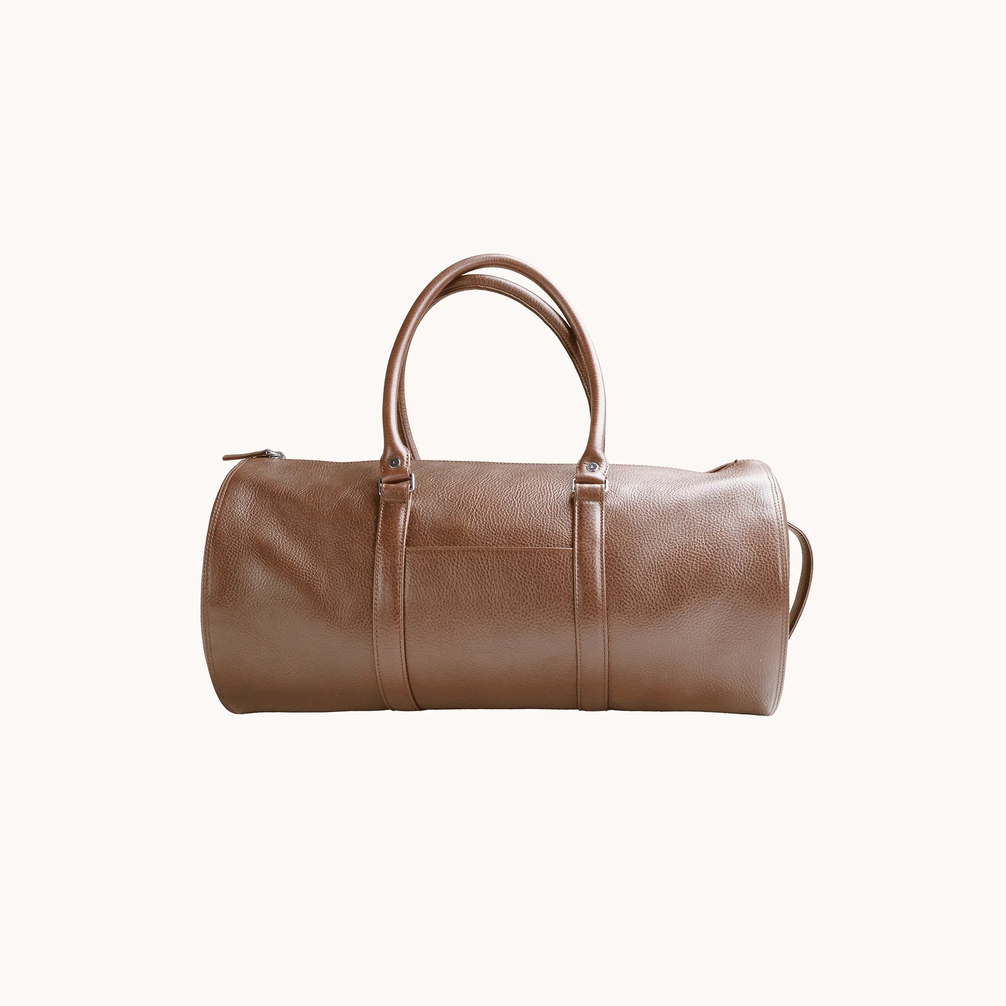 Lunburg Estate Club Bag in tumbled Heritage Amber leather, front view with twin top handles and exterior trim.