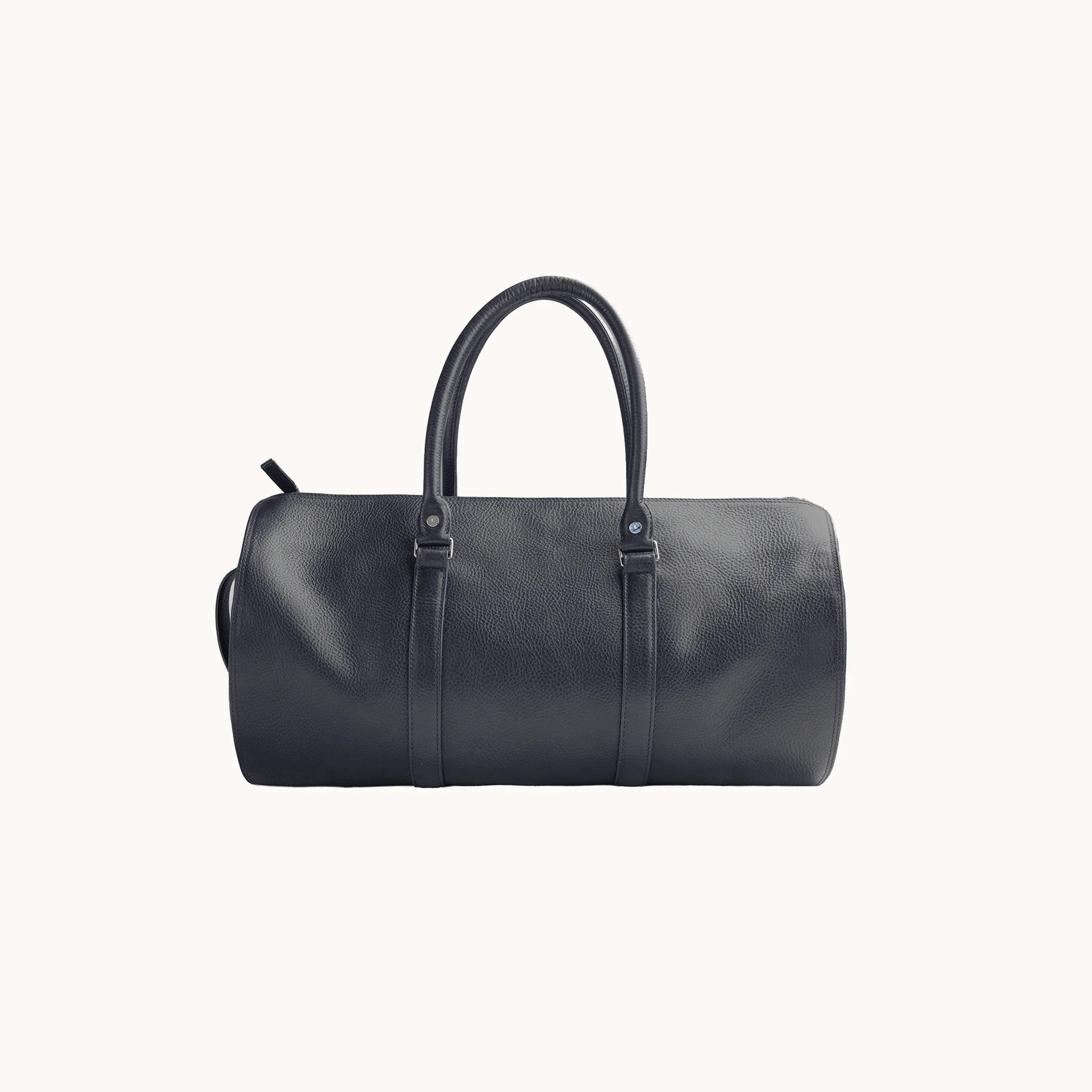 Lunburg Estate Club Bag in tumbled Nocturnal Sapphire leather, back view of the clean panelled body.