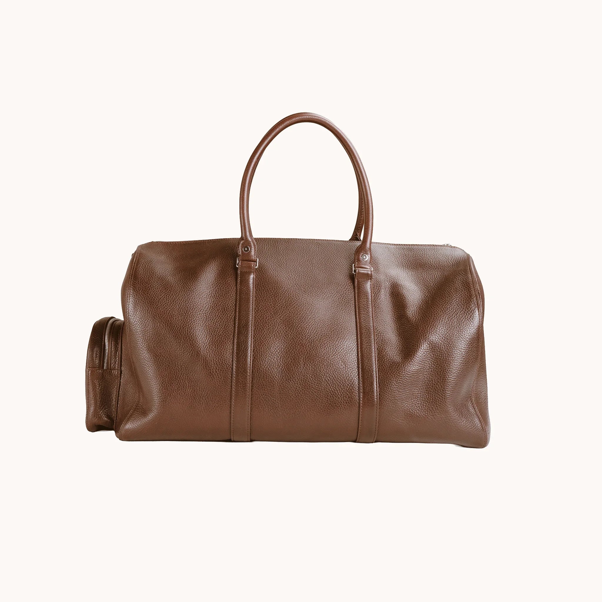 Lunburg Estate Duffle Bag in tumbled Heritage Amber leather, back view of the clean panelled body.