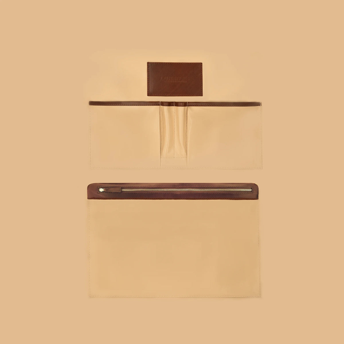 Lunburg Opus Briefcase Classic interior vertical layout in Deep Mahogany, high-contrast goat leather lining with heat-embossed Lunburg card holder, two pen holders, two large open pockets for documents and accessories, and one large zipped pocket for secure storage, with Deep Mahogany Perpetual Leather (from Tempesti) trim and 316L stainless steel hardware.