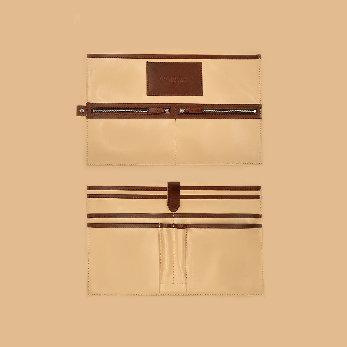 Lunburg Opus Briefcase Integral interior vertical layout in Deep Mahogany, high-contrast goat leather lining with heat-embossed Lunburg card holder, two pen holders, dedicated compartments for laptop, tablet, and documents, two zipped pockets for secure storage, and four large open pockets for accessories, with Deep Mahogany Perpetual Leather (from Tempesti) trim and 316L stainless steel hardware.