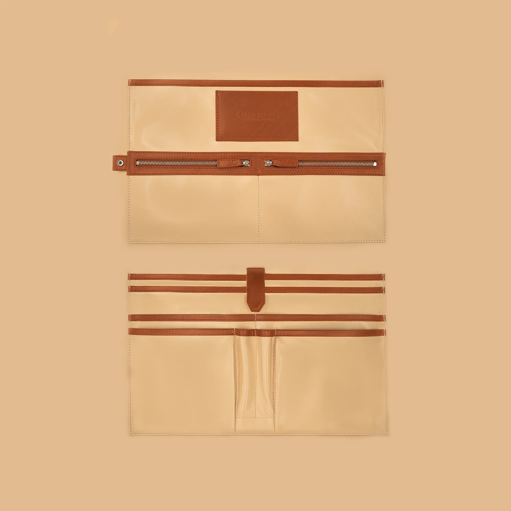 Lunburg Opus Briefcase Integral interior vertical layout in Heritage Amber, high-contrast goat leather lining with heat-embossed Lunburg card holder, two pen holders, dedicated compartments for laptop, tablet, and documents, two zipped pockets for secure storage, and four large open pockets for accessories, with Heritage Amber Perpetual Leather (from Tempesti) trim and 316L stainless steel hardware.