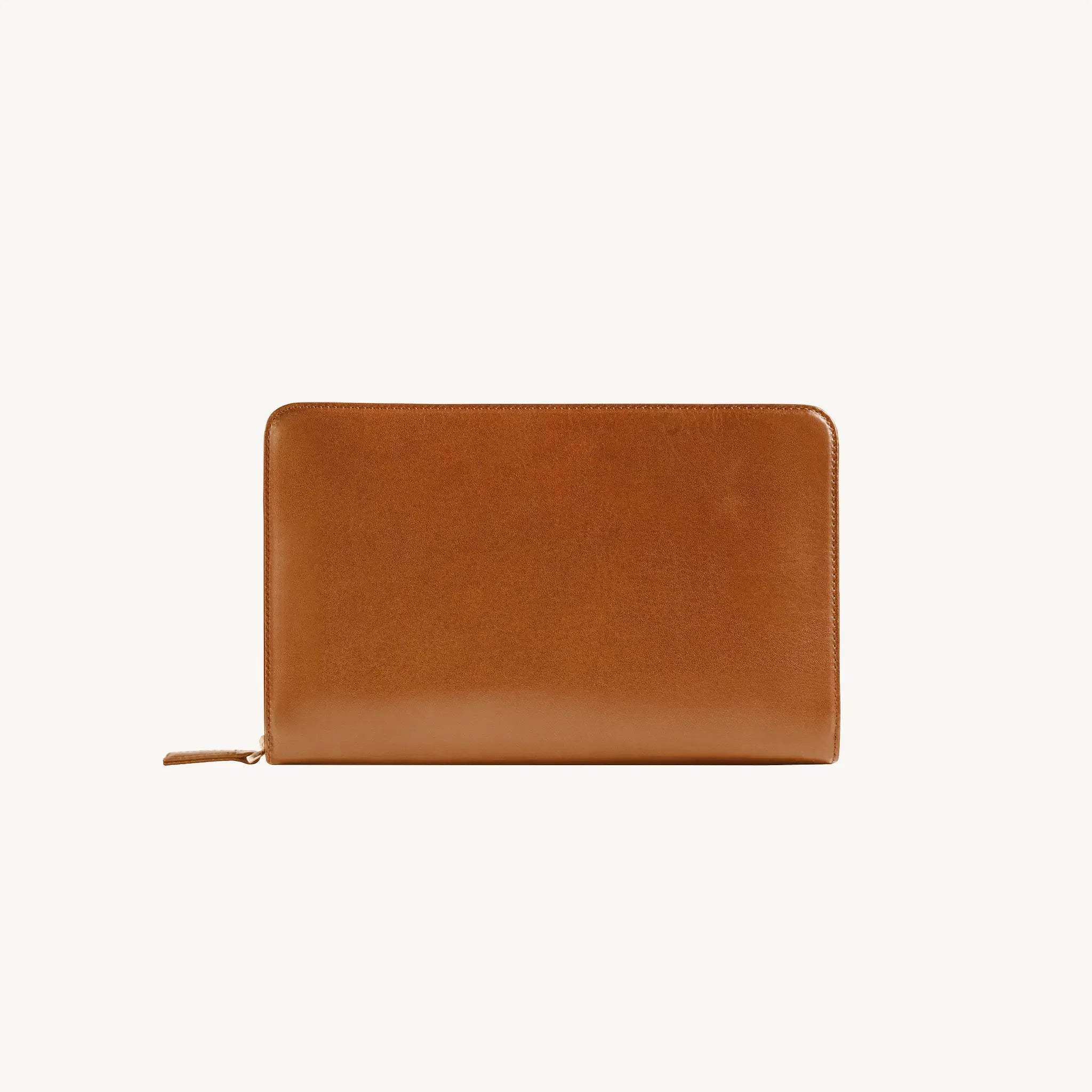 Lunburg Memoir Organiser in Heritage Amber, back view showing the clean rear panel and YKK Excella zipper with leather pull, in vegetable-tanned Perpetual Leather (from Tempesti) with folded edge construction.