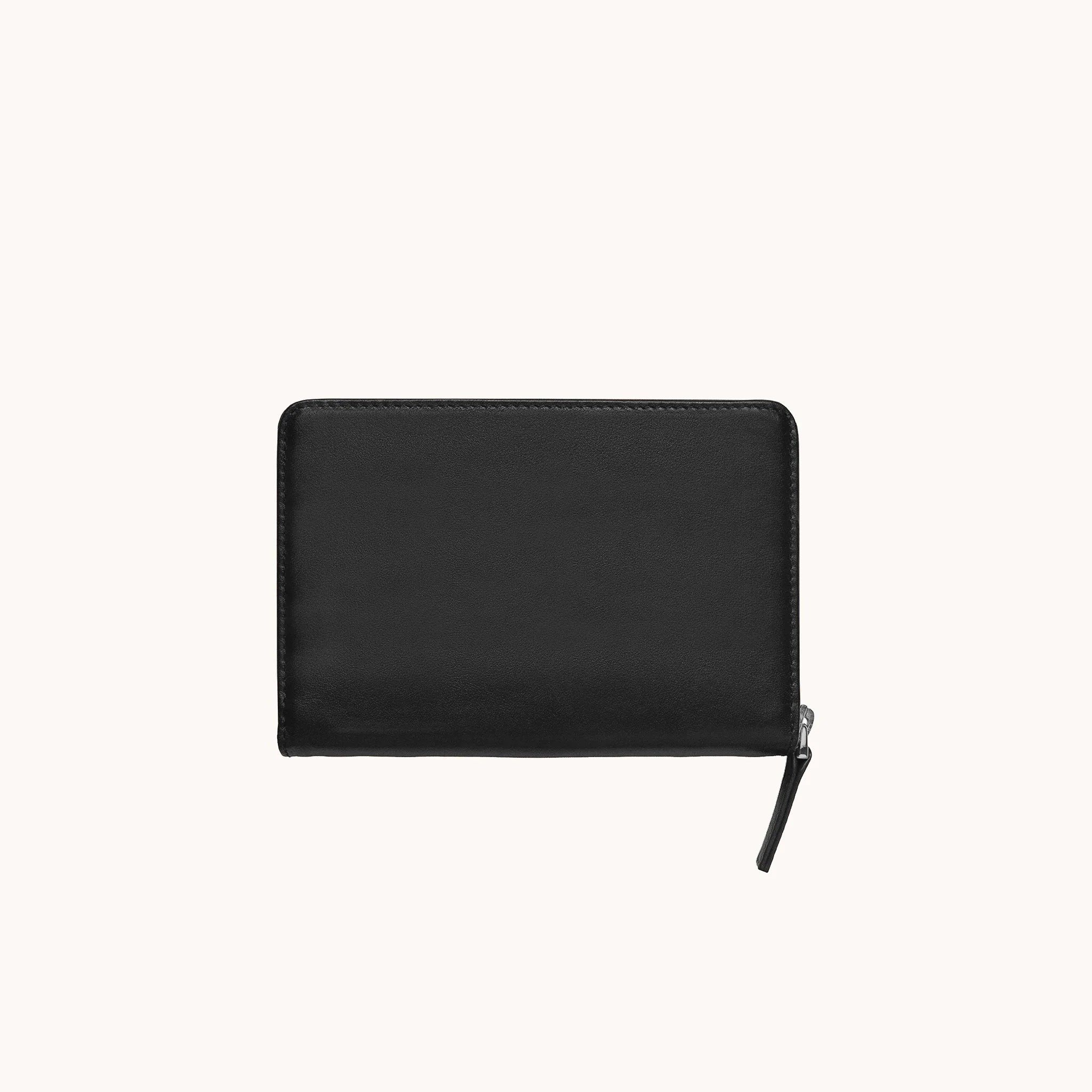 Lunburg Quad Pen Case Curator in Burnt Timber, front view of closed case in vegetable-tanned Perpetual Leather (from Tempesti), YKK Excella zipper pull resting at lower left, folded edge construction visible along all perimeter edges.