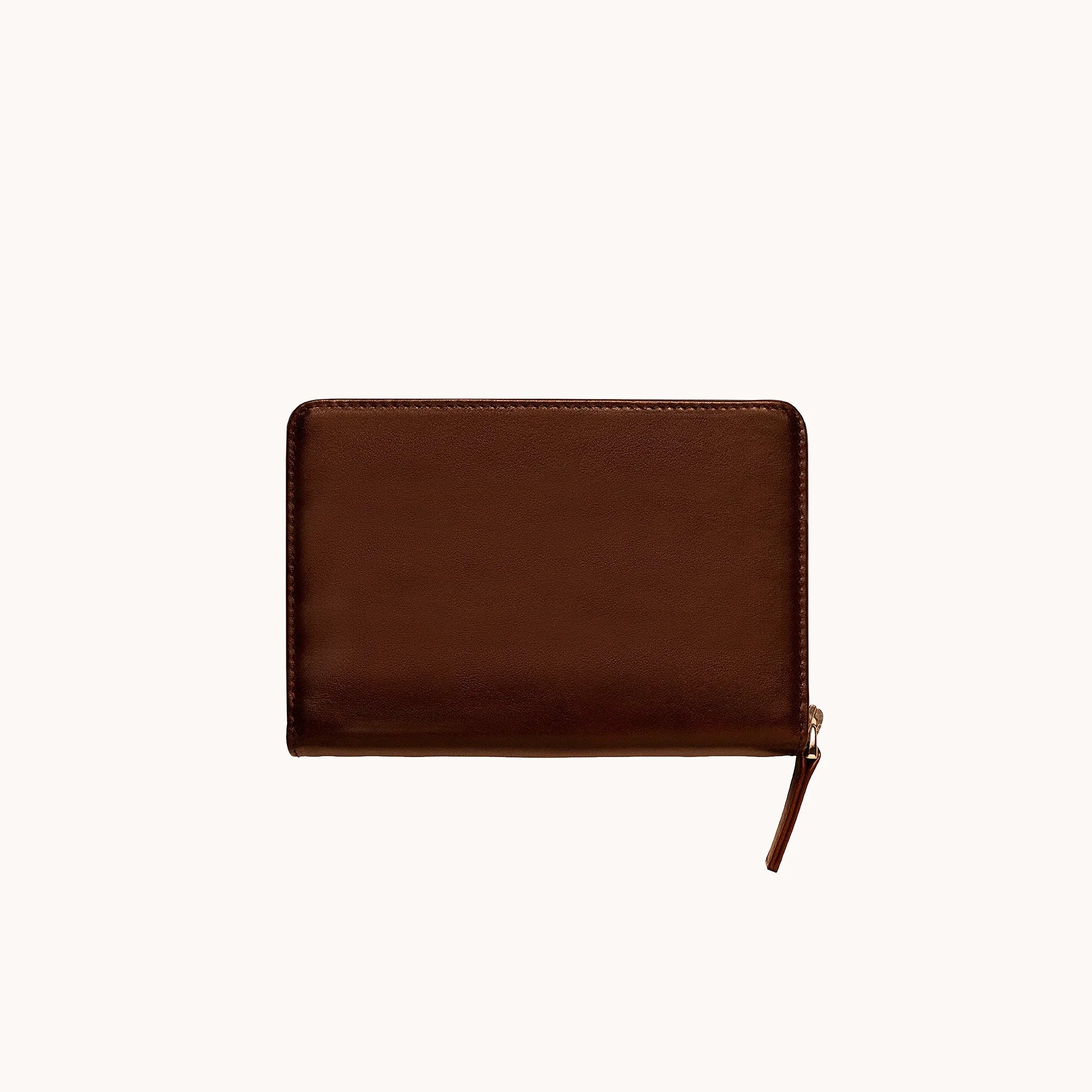 Lunburg Quad Pen Case Curator in Deep Mahogany, front view of closed case in vegetable-tanned Perpetual Leather (from Tempesti), YKK Excella zipper pull resting at lower left, folded edge construction visible along all perimeter edges.