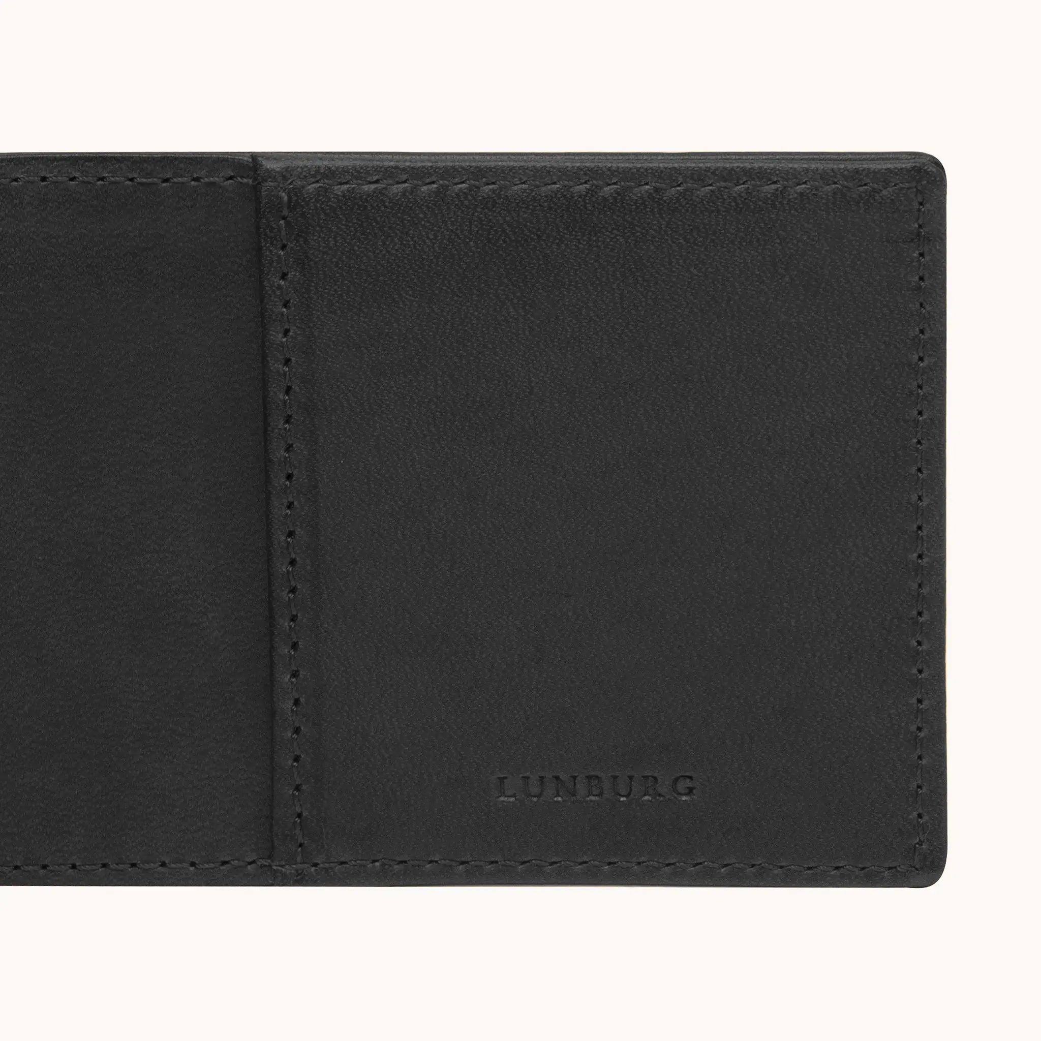 Lunburg Signet Small Horizontal in Burnt Timber, detail view of the interior right panel showing the heat-embossed Lunburg mark beside the card slot partition, in vegetable-tanned Perpetual Leather (from Tempesti) with folded edge construction throughout.