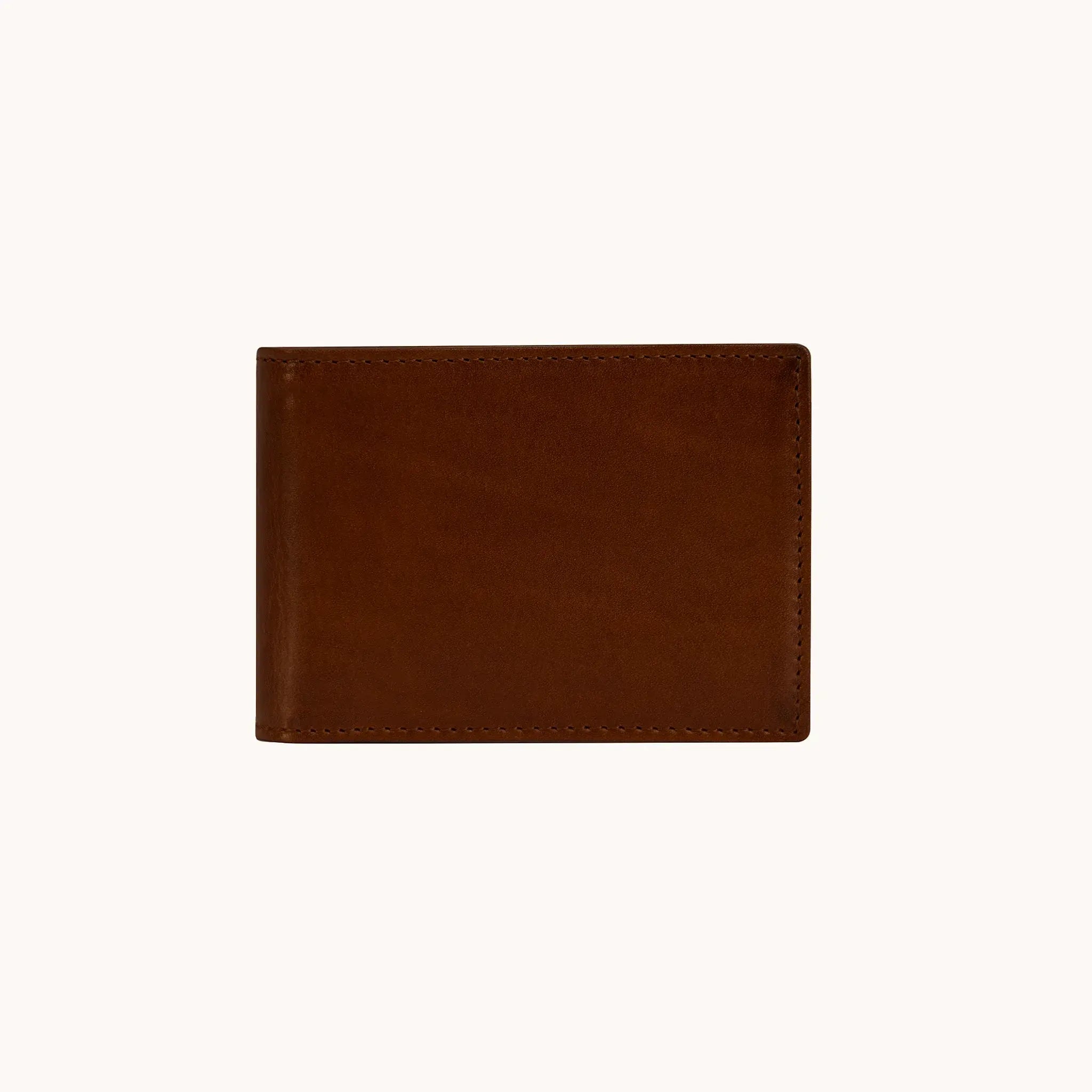 Lunburg Signet Small Horizontal in Deep Mahogany, front view closed, showing the clean face of vegetable-tanned Perpetual Leather (from Tempesti) with folded edge construction and no visible raw edges.