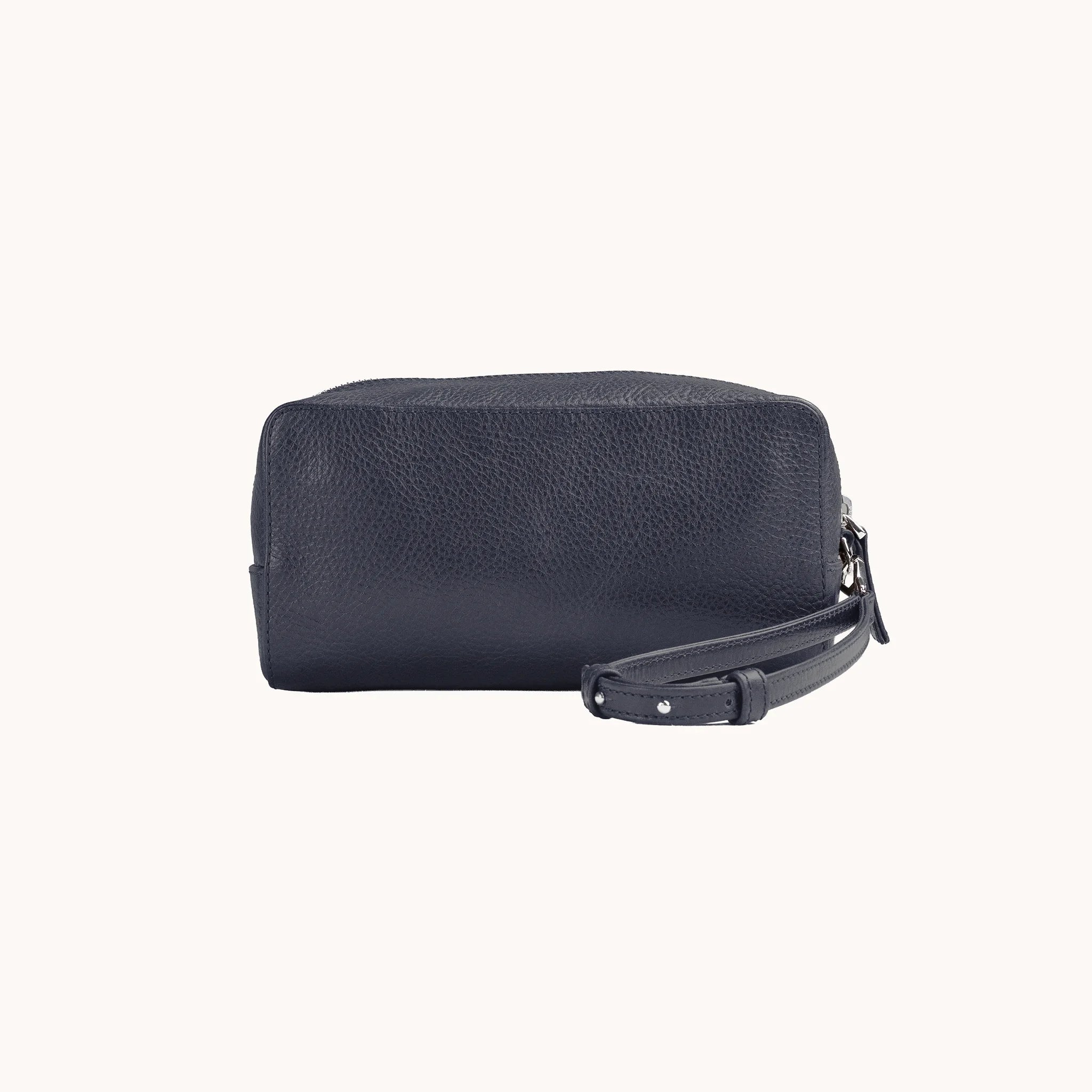 Lunburg Chamberlain Toiletry Bag in tumbled Nocturnal Sapphire leather, front view of the compact travel case.