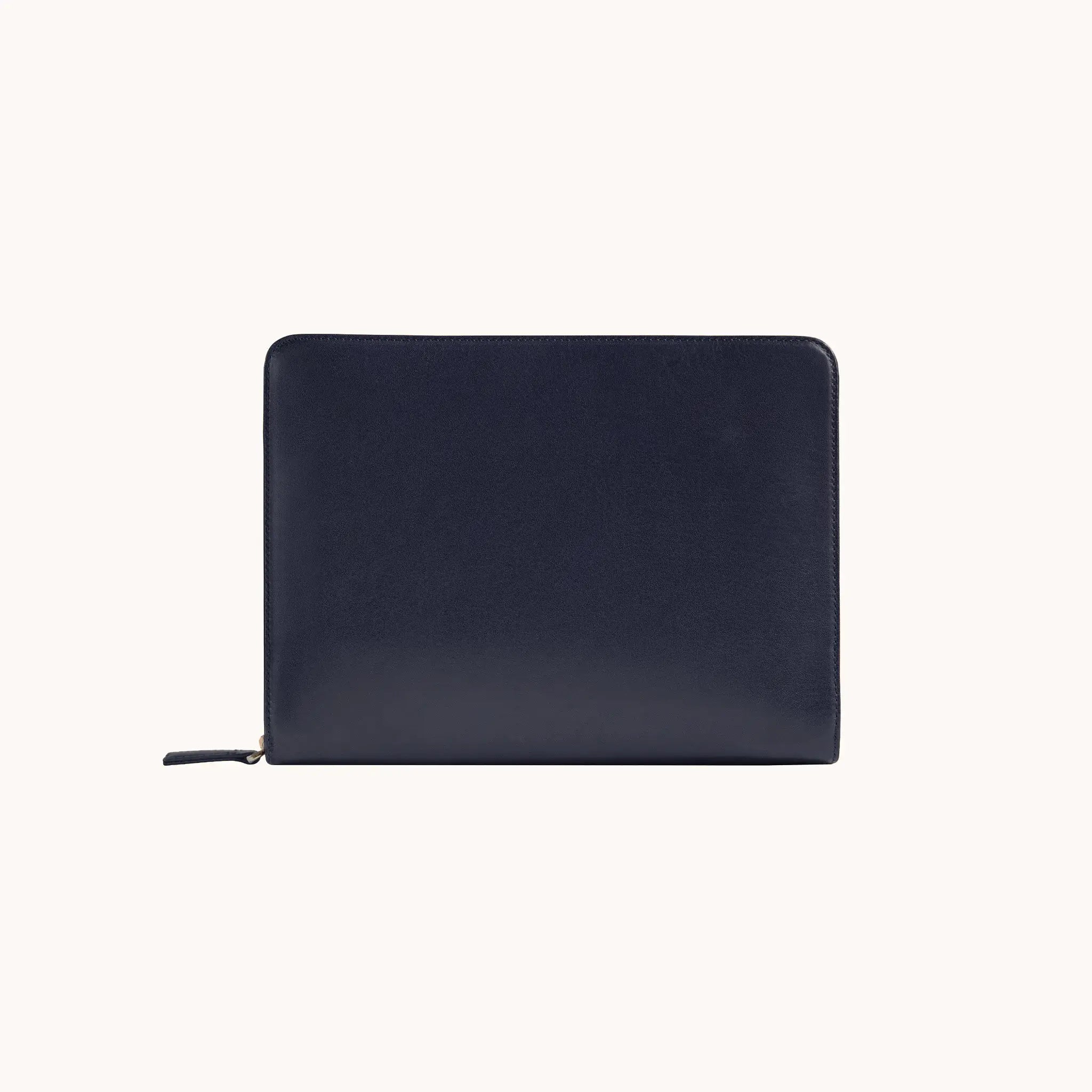 Lunburg Memoir Workstation in Nocturnal Sapphire, back view showing the clean rear panel and YKK Excella zipper with leather pull, in vegetable-tanned Perpetual Leather (from Tempesti) with folded edge construction.